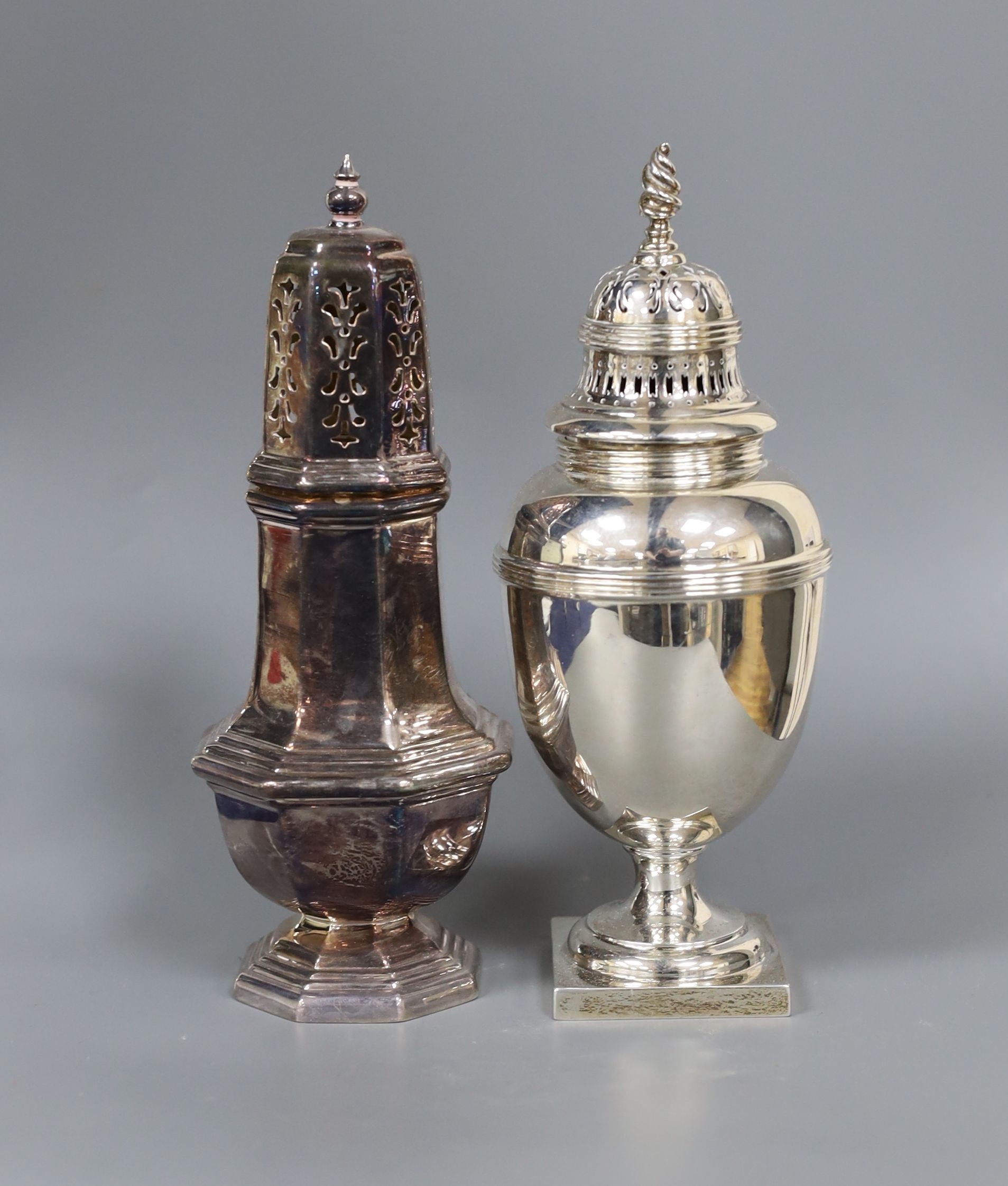 A George V silver baluster sugar caster, London, 1926, 18.5cm and a later silver octagonal sugar caster, 13.5oz.